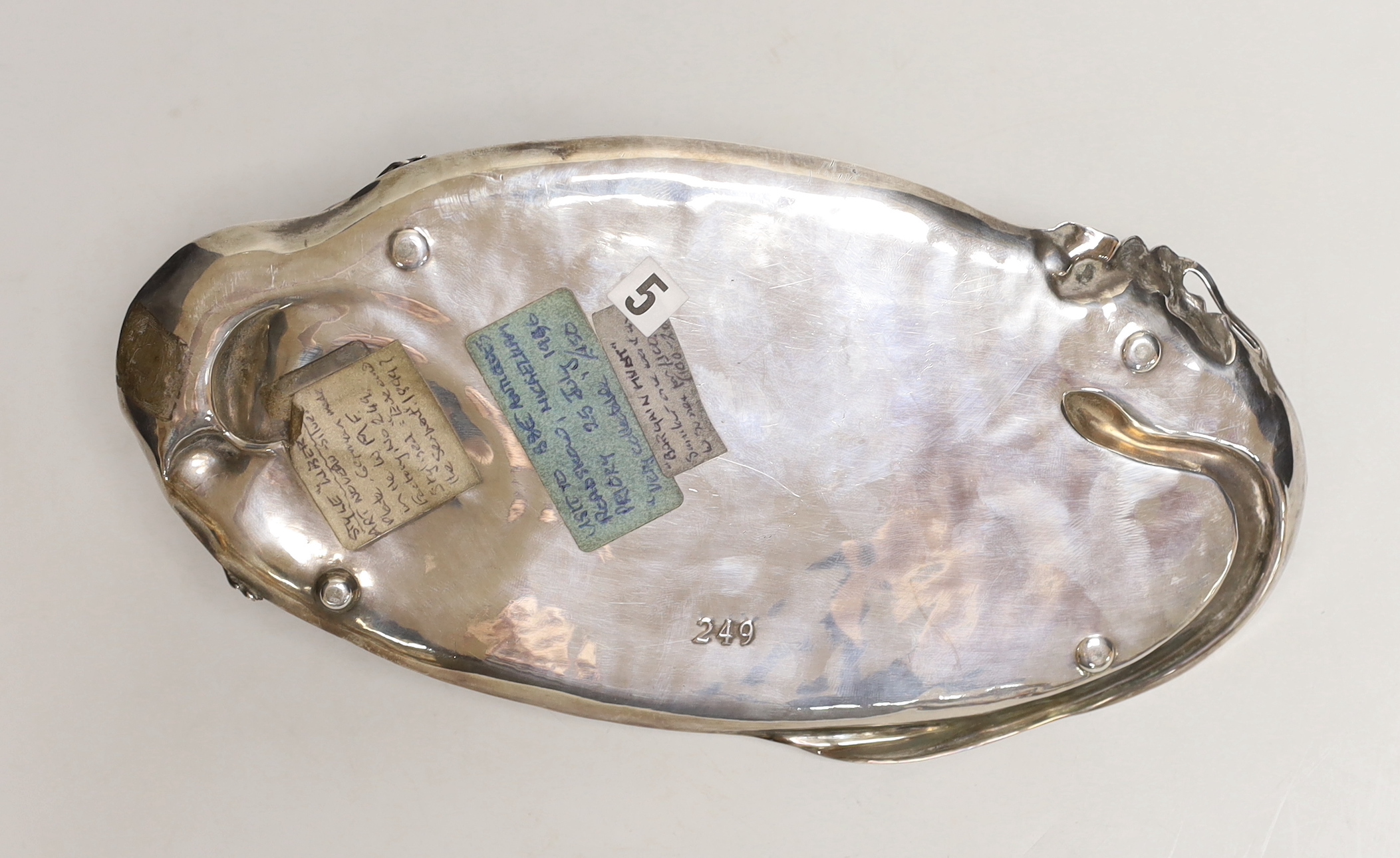 An Art Nouveau WMF (Wurttemburgerische Metallwarenfabrik) polished pewter figural tray, 25cm long